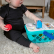 Hape Baby Einstein Magic touch Пазарска кошница за сортиране - Интерактивна играчка, 14.3 x 26.6 x 20.2 см